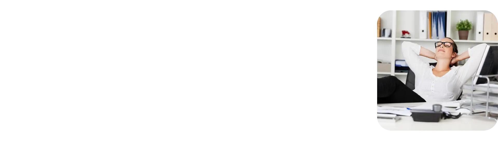 A woman at her desk uses Retail401k tools for multiple employer plan support.